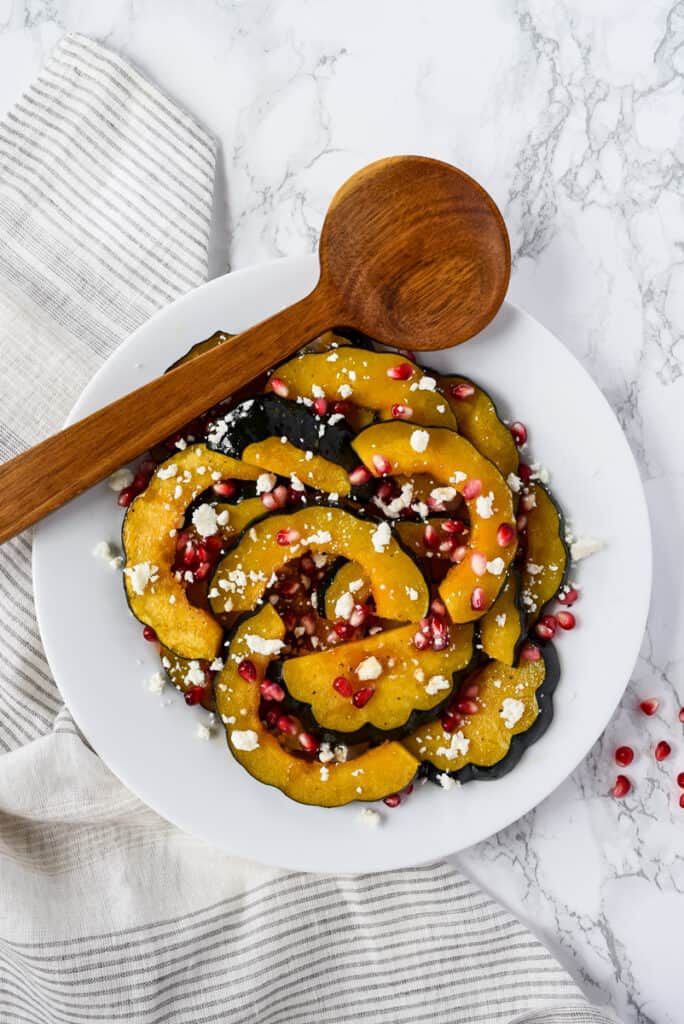 Maple Acorn Squash with Pomegranate and Goat Cheese