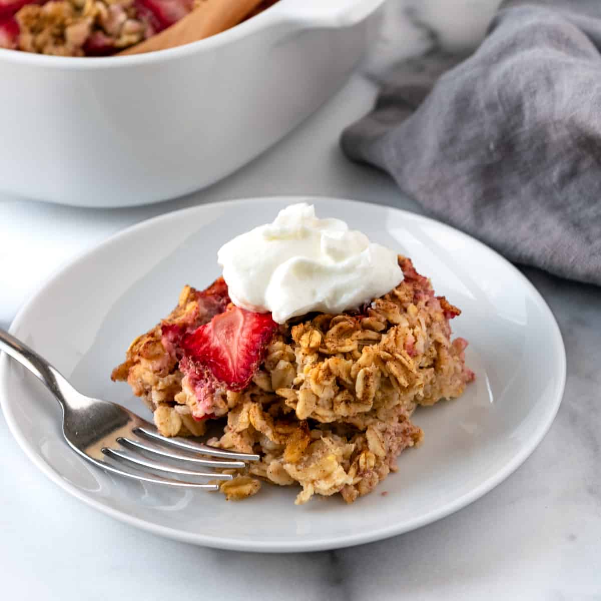 Strawberry Baked Oatmeal on a white plate.