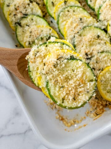 Zucchini and Squash Bake with a serving spoon.