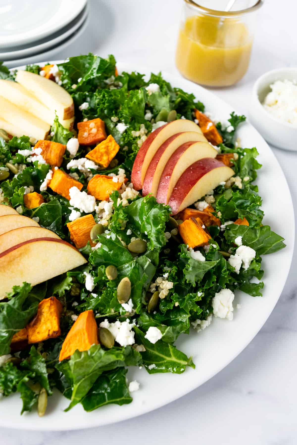 Fall Kale Salad with Sweet Potato and sliced apples.
