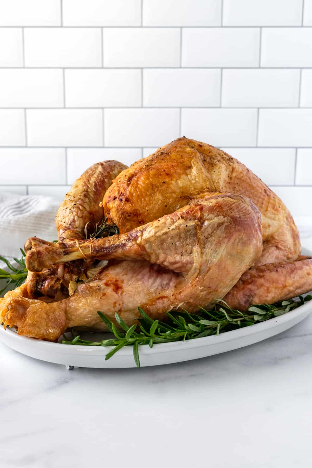 Easy Roast Turkey on a white serving platter.
