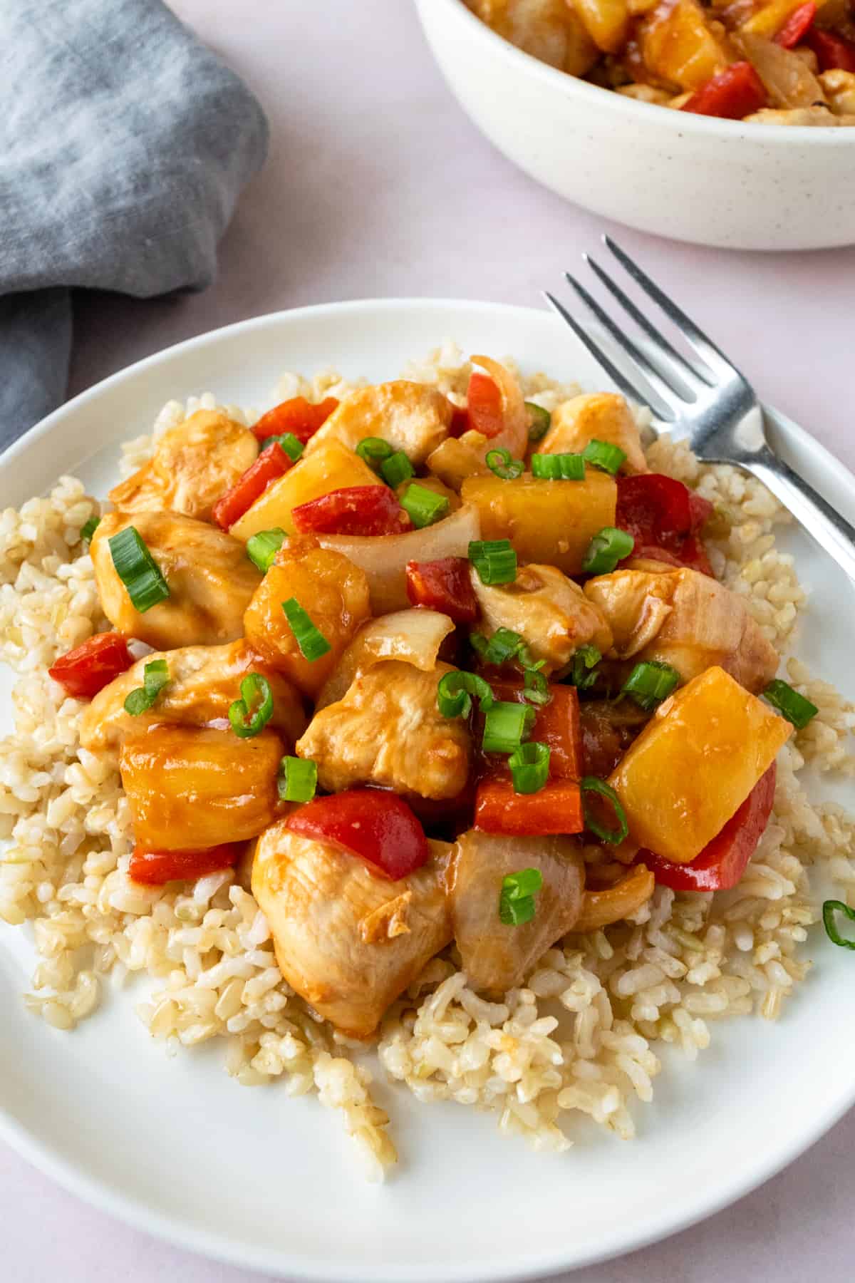 Air Fryer Sweet and Sour Chicken on a white plate.