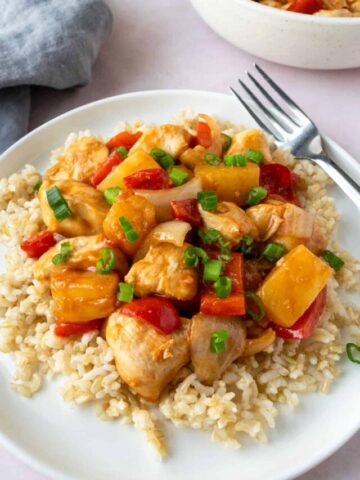 Air Fryer Sweet and Sour Chicken on a white plate.
