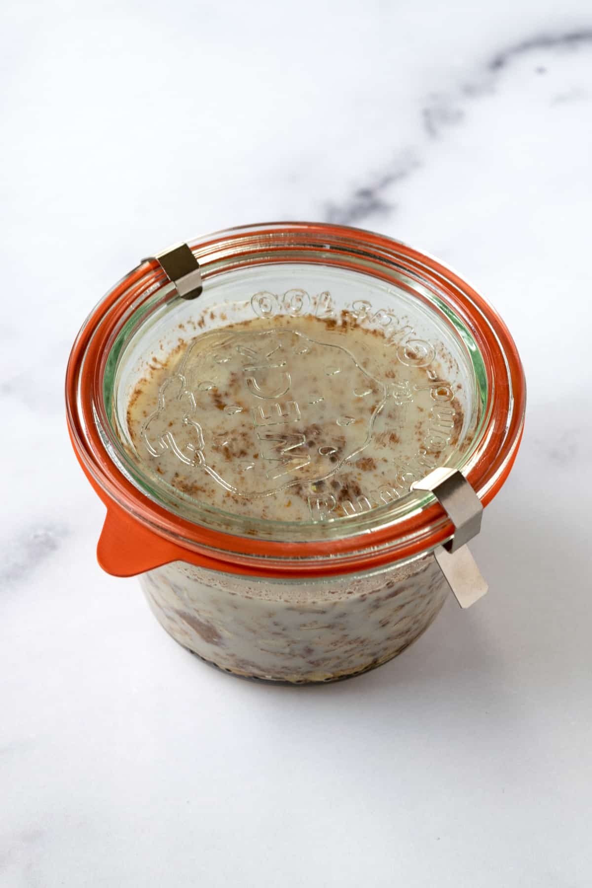 Cookie Dough Overnight Oats in a glass jar.