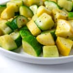 Air Fryer Zucchini and Squash on a white plate.