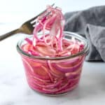 Quick Pickled Red Onions with a Fork.
