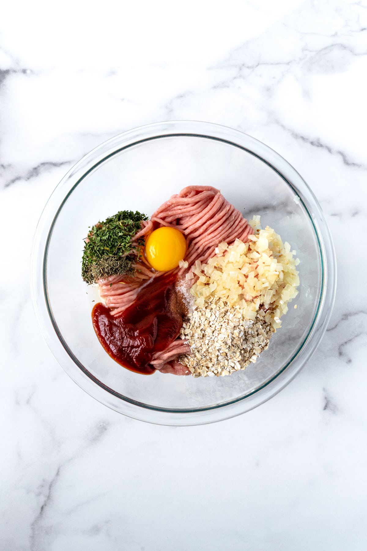 Turkey Meatloaf Ingredients in a Glass Bowl.