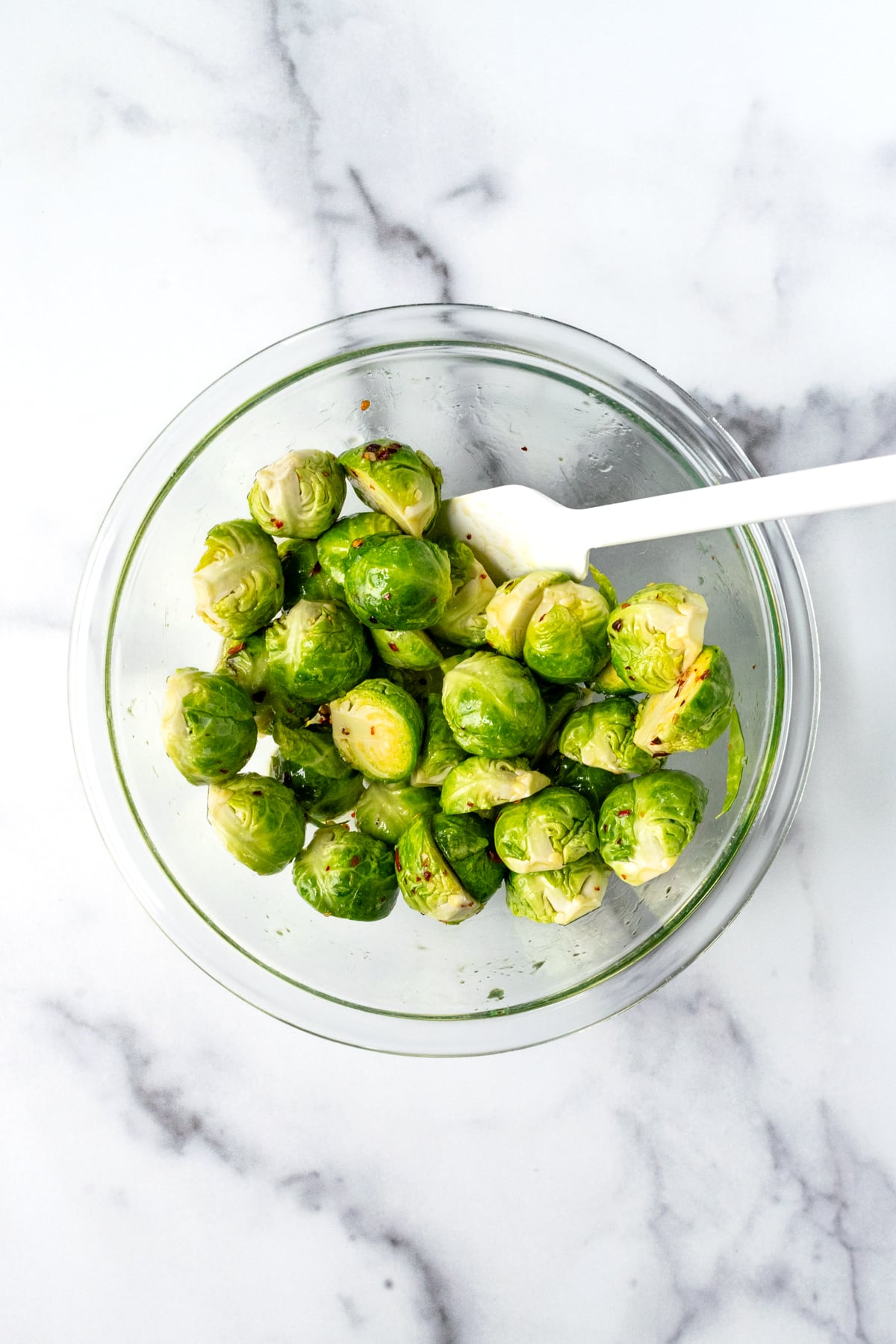Hot Honey Brussels Sprouts Ingredients in a Glass Bowl.