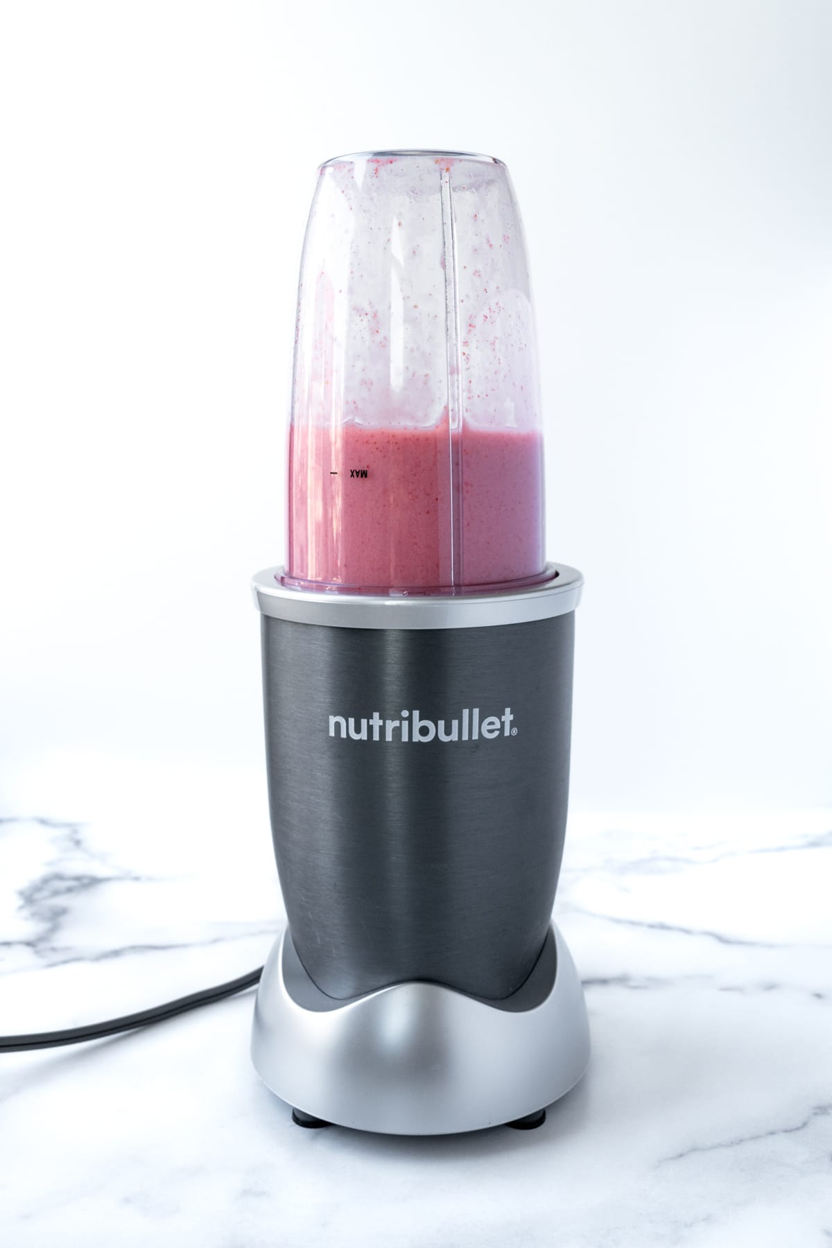 Almond Milk Strawberry Smoothie in a small blender.