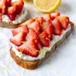 Strawberry Ricotta Toast on parchment paper.