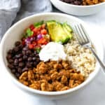 Turkey Burrito Bowls with avocado, pico de gallo, and beans.