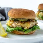 Turkey Smash Burgers on buns with onions, pickles, and cheese.