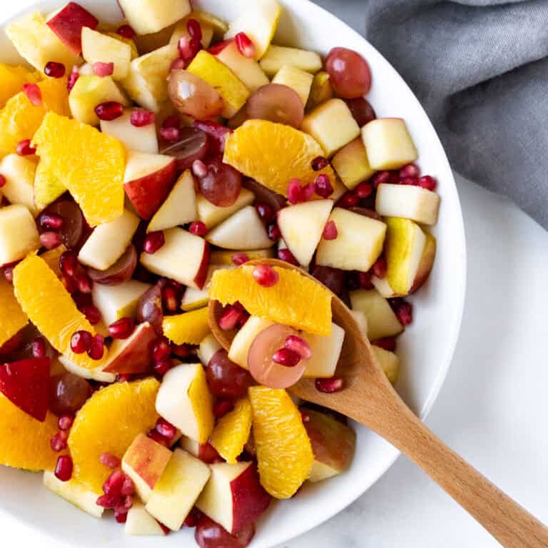 Fall Fruit Salad in a white bowl.