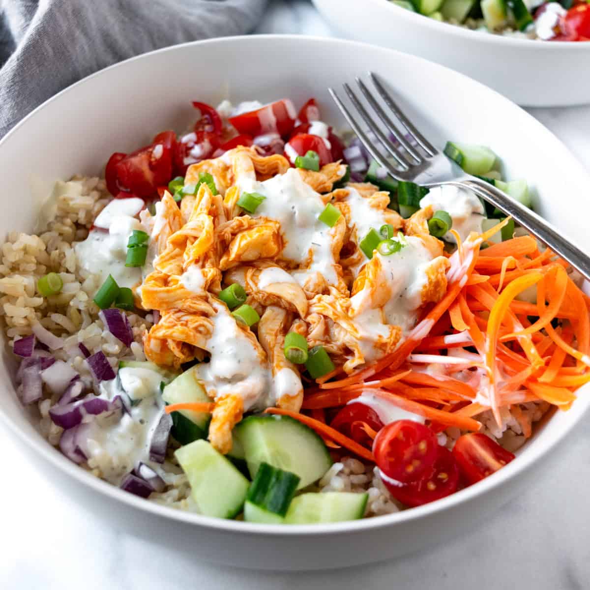 Buffalo Chicken Rice Bowls on a countertop.