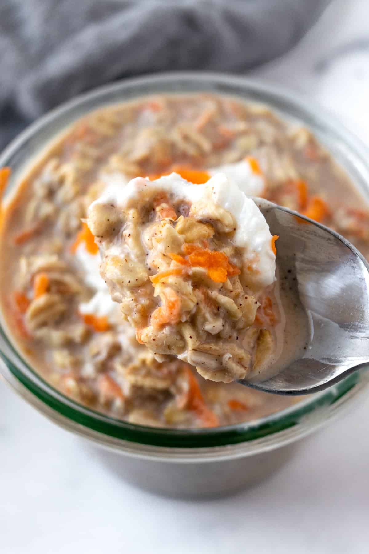 A spoonful of Carrot Cake Overnight Oats.
