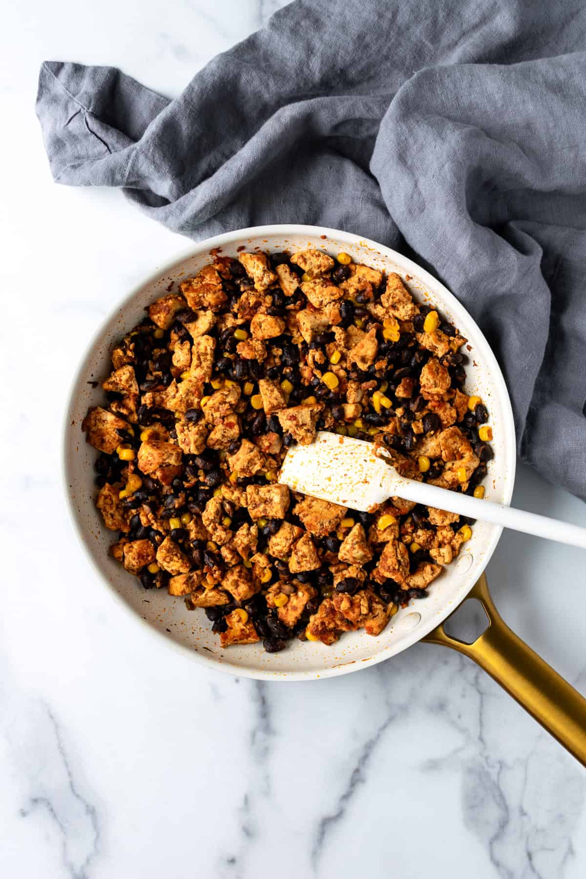 Tofu Taco Meat with Beans and Corn in a skillet.