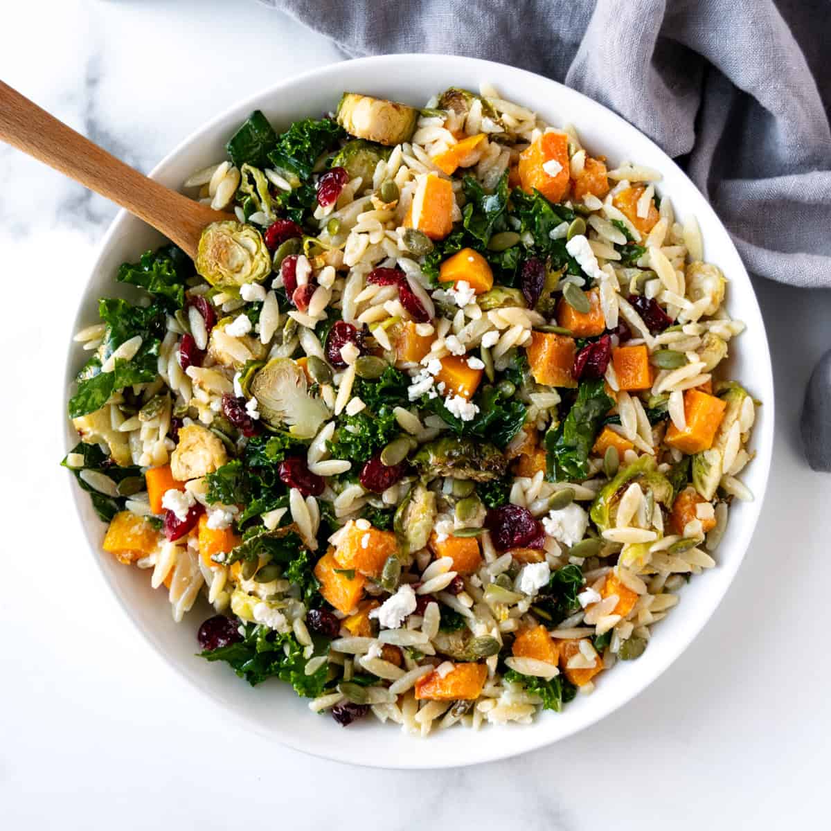 Fall Orzo Pasta Salad in a white bowl.