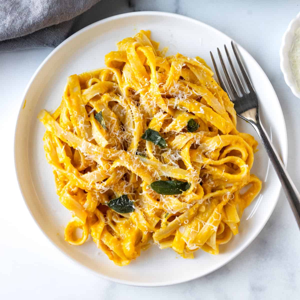 Pumpkin Fettuccine Alfredo in a white plate.