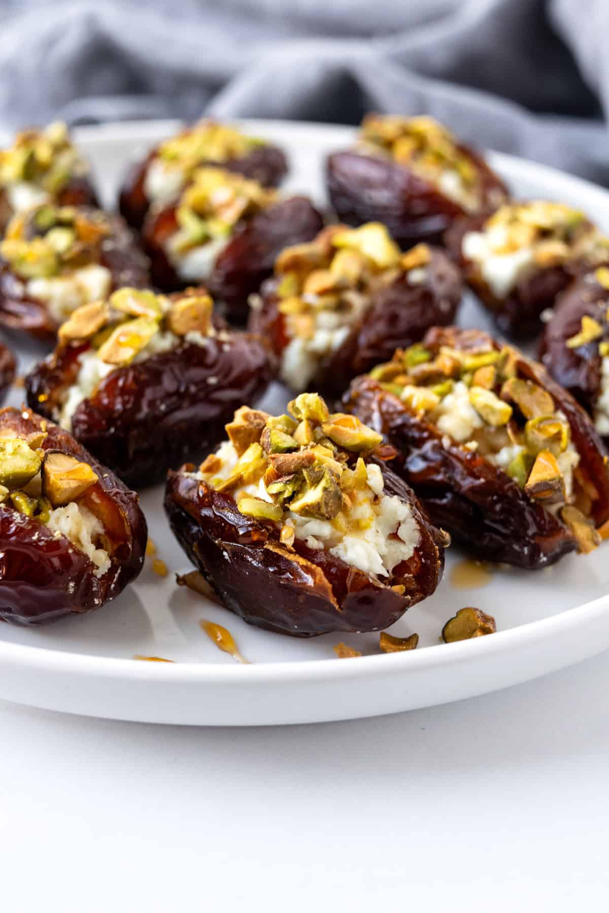 Goat Cheese Stuffed Dates topped with Pistachios.