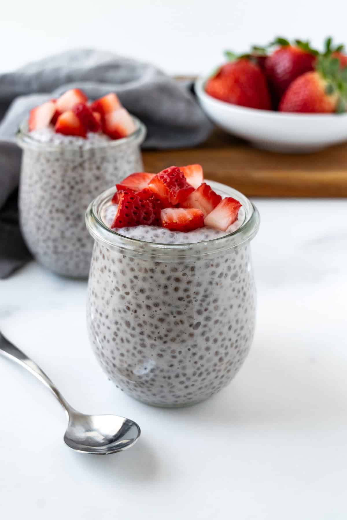Strawberry Chia Pudding on a marble countertop.