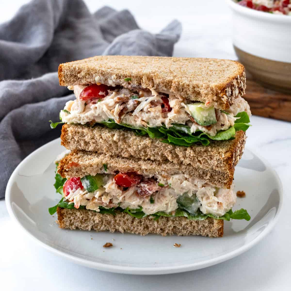 BLT Chicken Salad Sandwich on a plate.