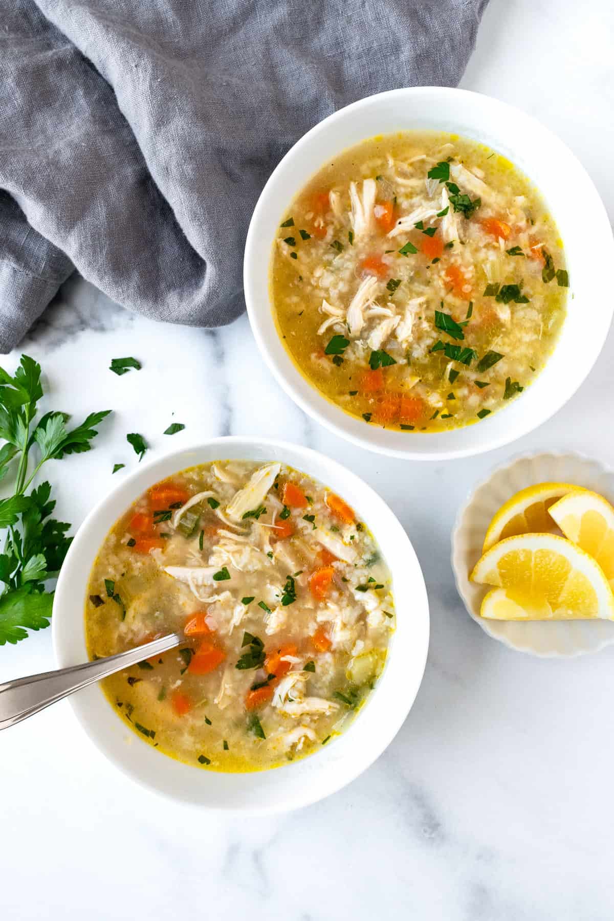 Lemon Chicken and Rice Soup in 2 bowls.