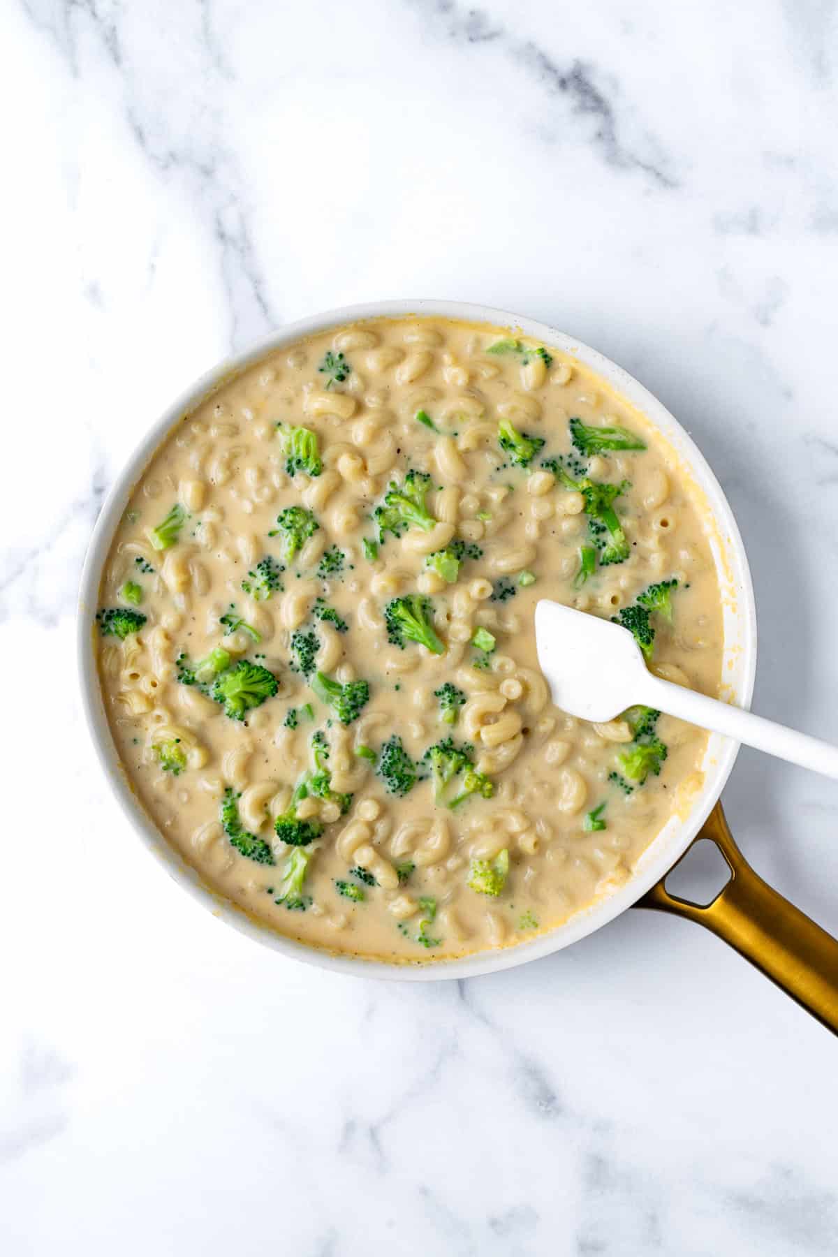 Broccoli Macaroni and Cheese in a skillet before baking.