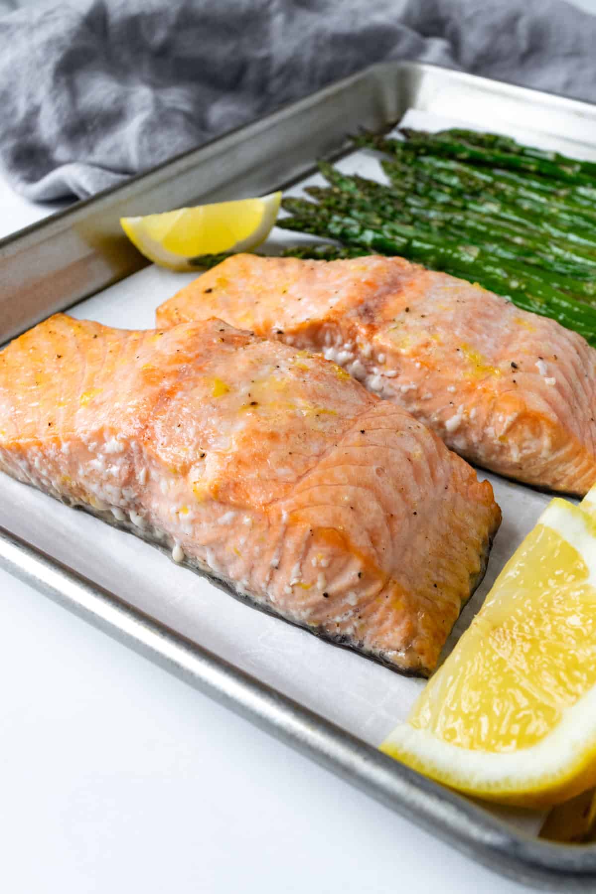 Sheet Pan Salmon and Asparagus on a baking sheet.