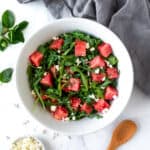 Watermelon Arugula Salad in a white bowl.